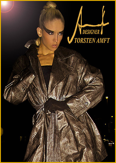 The international model Vera Gafron weares a weatherproof rain coat in animal optic manufactured by German fashion designer Torsten Amft - Berlin.