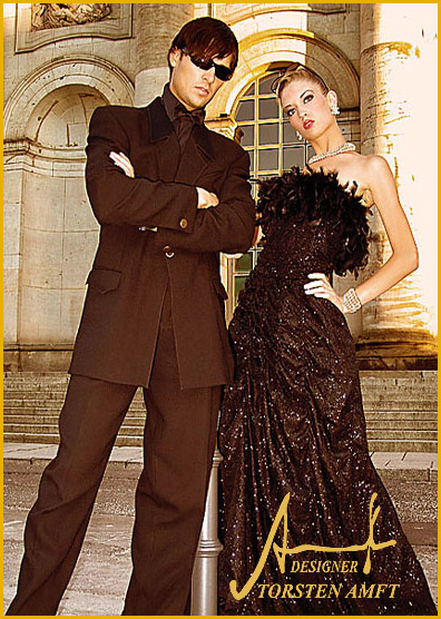 The international model Vera Gafron in a great black gala gown with handcrafted frame of plume and diamond crystals & model Marcel Haas in a black smoking with silk collar manufactured by german fashion designer Torsten Amft from Berlin.