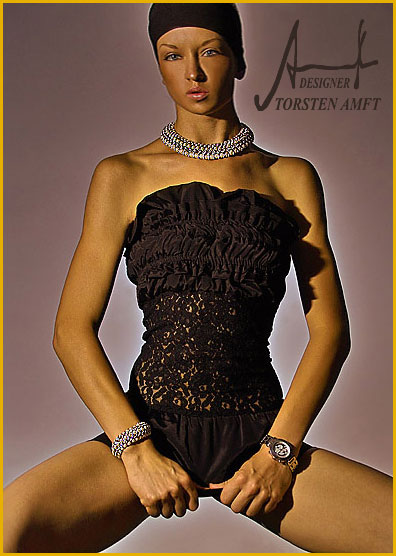 The international model Vera Gafron in a black cocktail dress with a French lace from German fashion designer Torsten Amft.