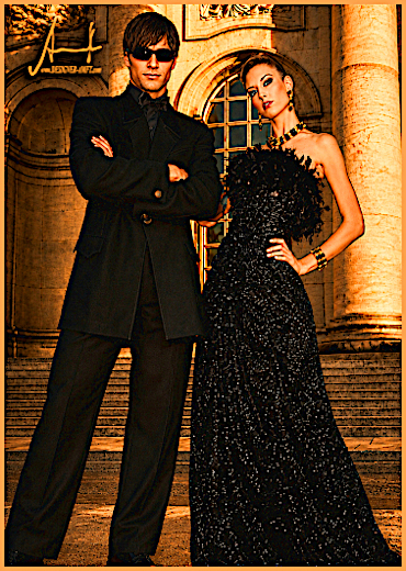 The international model Vera Gafron in a great black gala gown with handcrafted frame of plume and diamond crystals & model Marcel Haas in a black smoking with silk collar manufactured by german fashion designer Torsten Amft from Berlin.