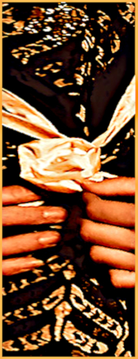 Detail view from structure of textile from black - cream colored gala robe with a handcrafted textile Rose flower from German fashion designer Torsten Amft - Berlin.